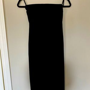 Black strapless dress size small. Falls below knee (mid-calf)